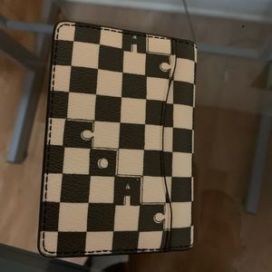 Black and white checkered leather wallet